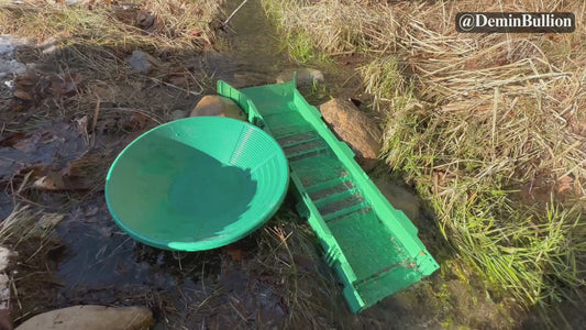 Portable gold panning kit with expandable sluice box used in river stream